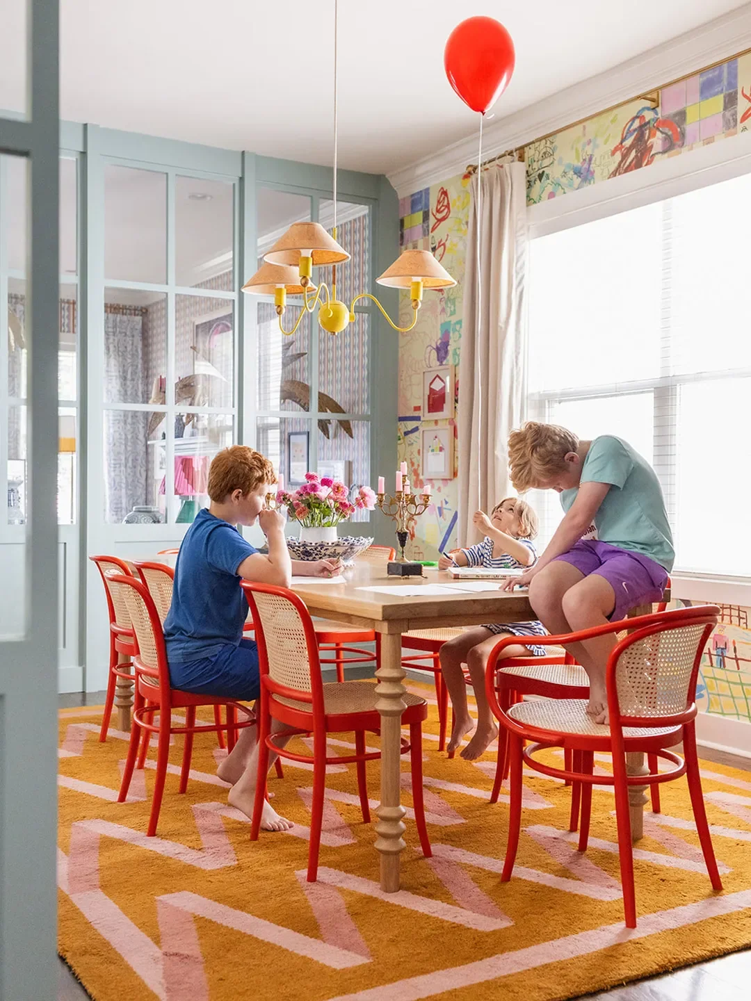 The True Masterminds Behind This Designer's Epic Dining Room Wallpaper? Her Three Kids