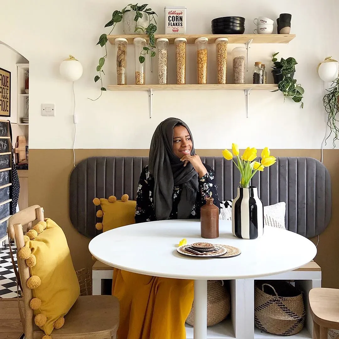 The Secret to This Renter’s Cozy Dining Nook? A Headboard (Yes, Really)